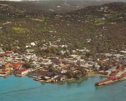Aerial view of Montego Bay, Jamaica in the 1970s, showcasing its vibrant harbor and coastal development.